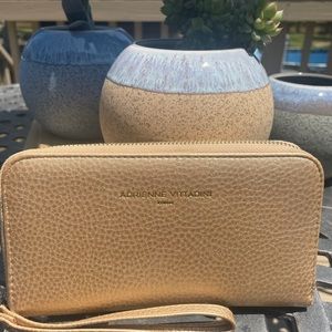Adrienne Vitadini wallet with phone charger.
